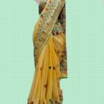 Half Tussar Silk Saree with Traditional Lambani Embroidery – Elegant Yellow Handloom Saree for Festive & Wedding Wear