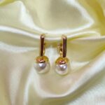 Geometric hoop with pearl earrings. Where modern geometry meets timeless pearls