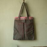 Hand-Woven Earth Tone Tote Bag with Pink Patterned Trim